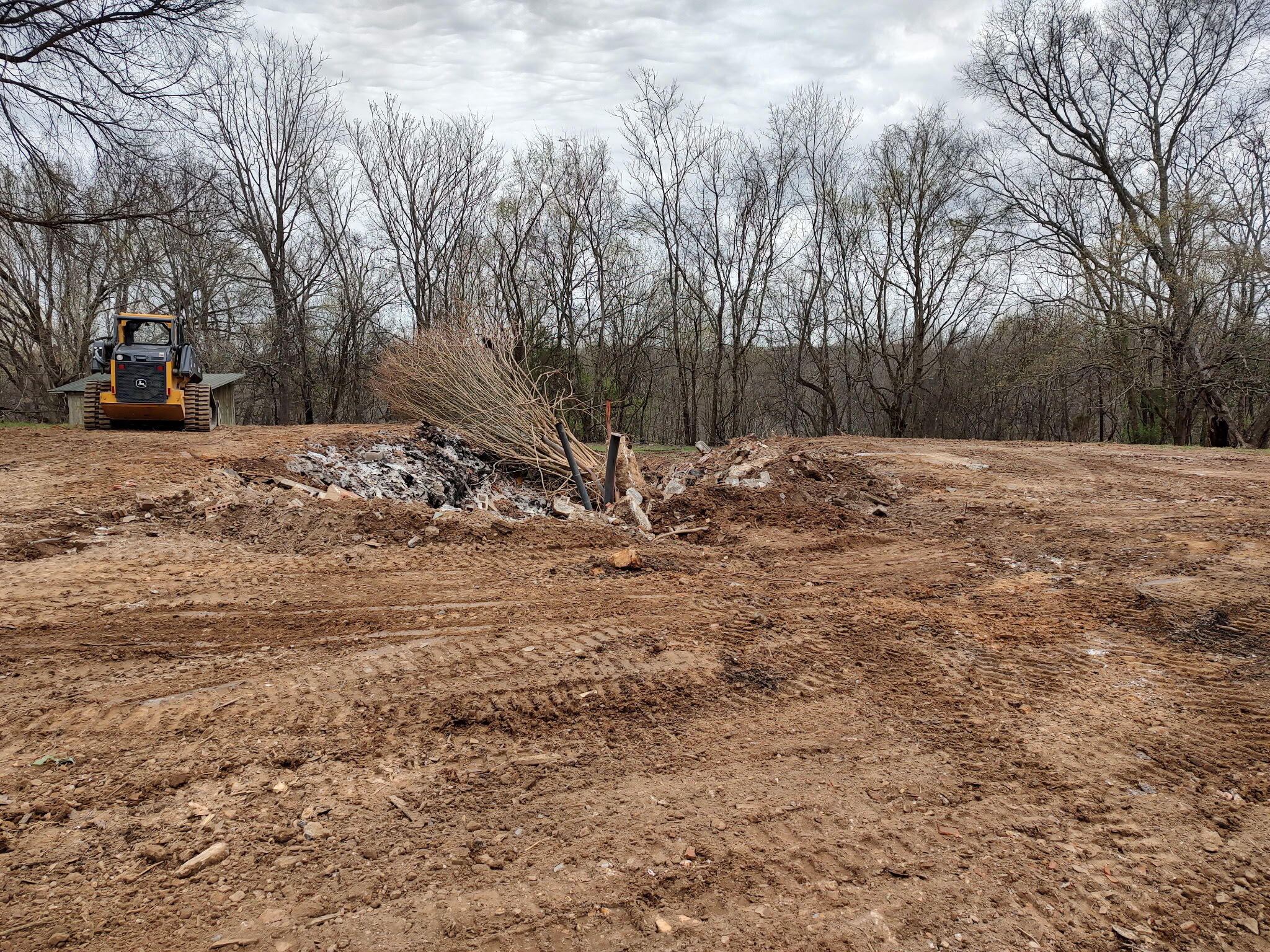 Dozer clearing a wooded property for site preparation